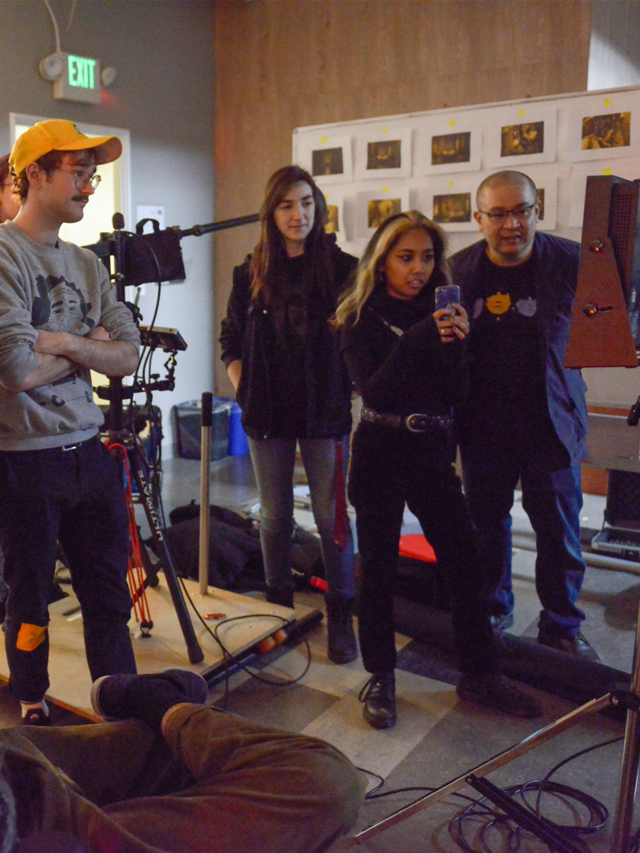 students on a filming studio set